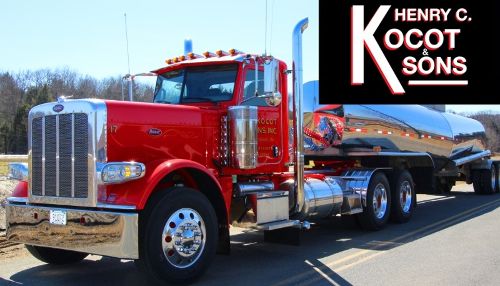 red Henry C. Kocot & Sons Inc. truck hauling a tank trailer